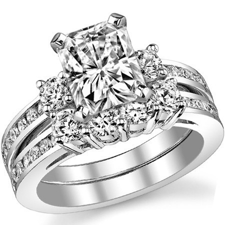 Round Brilliant Moissanite Three-Stone Style Engagement Ring, 0.58ct ...